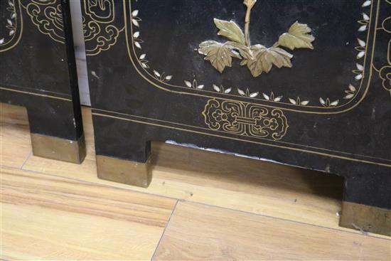 An Oriental four fold lacquer screen W.162cm